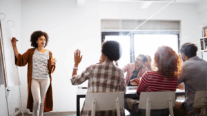 People sitting around a table discussing something