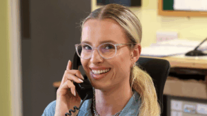 Hafod Housing Association A colleague smiling whilst talking on the phone